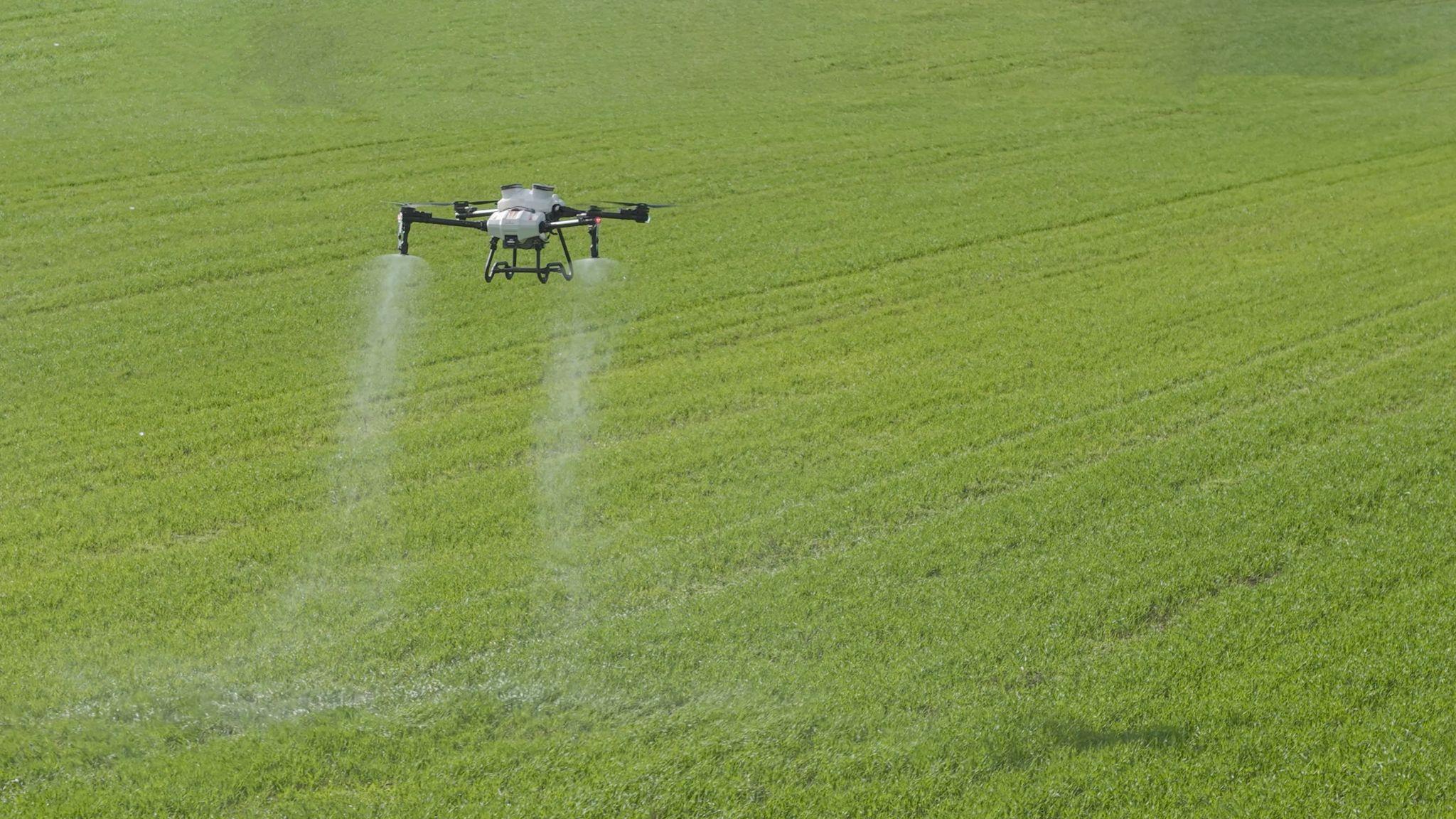 Spraying drone on difficult terrain